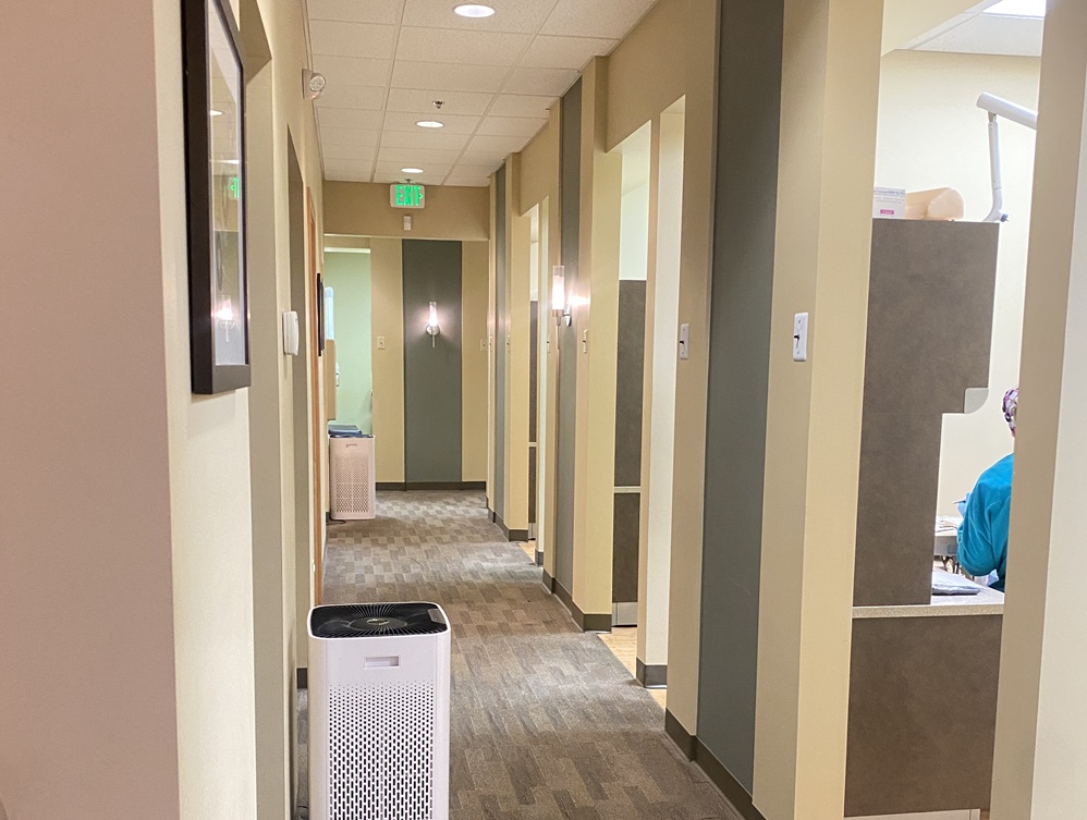 A hallway in a dental clinic with treatment rooms on the sides - Dentist Graham WA A hallway in a dental clinic with treatment rooms on the sides - Dentist Graham WA