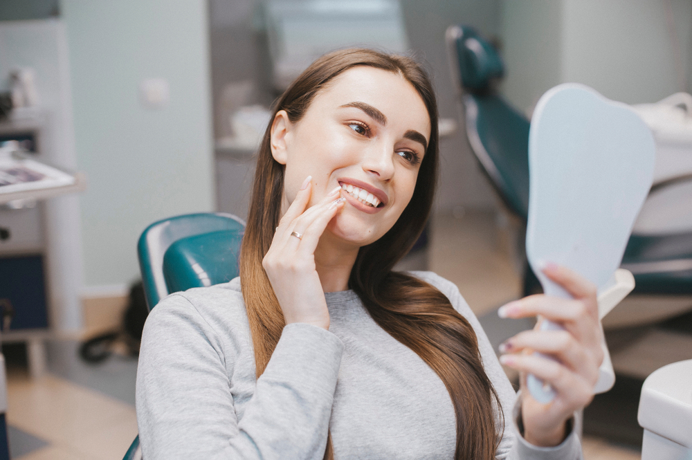 Woman checking her teeth - Cone Beam CT Scan